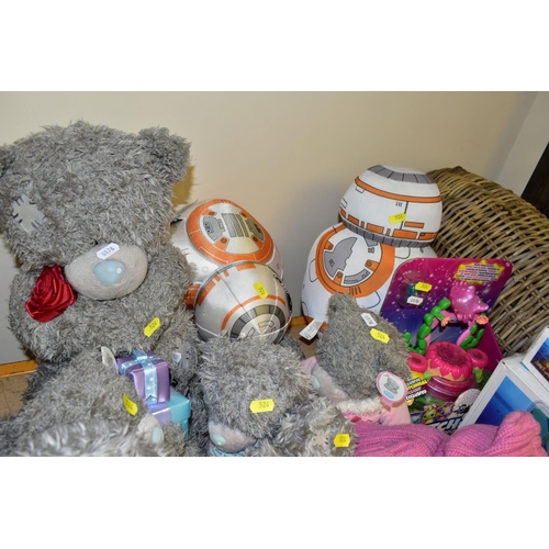 524 - A QUANTITY OF TOYS, SOFT TOYS, JIGSAWS, WALKING STICKS, etc, including a boxed pair of ladies red sa... 