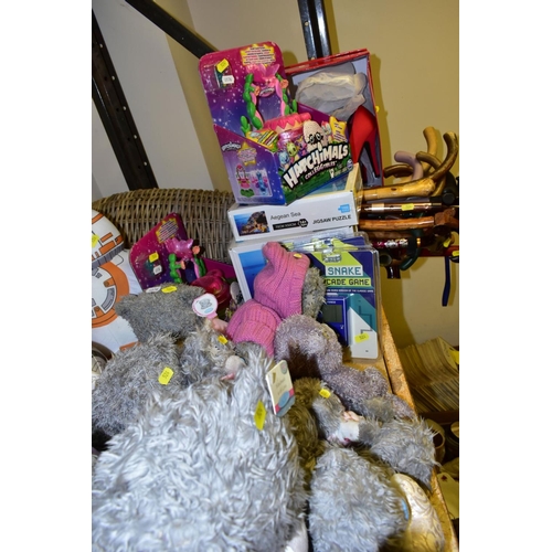 524 - A QUANTITY OF TOYS, SOFT TOYS, JIGSAWS, WALKING STICKS, etc, including a boxed pair of ladies red sa... 