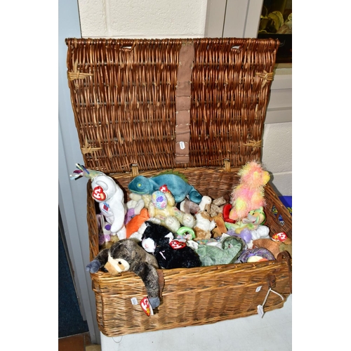 547 - A WICKER BASKET CONTAINING A COLLECTION OF TY BEANIE BABIES, majority complete with tag and label an... 