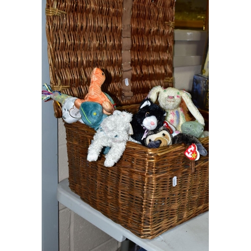 547 - A WICKER BASKET CONTAINING A COLLECTION OF TY BEANIE BABIES, majority complete with tag and label an... 