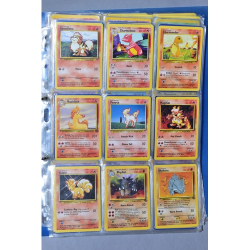 548 - A QUANTITY OF POKEMON CARDS - over four hundred cards of various sets including Base Set, Fossil Set... 