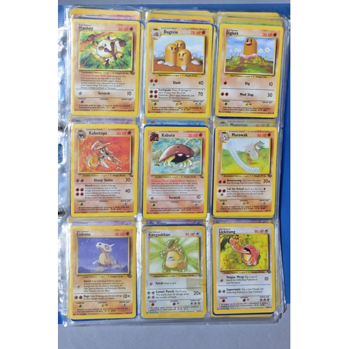 548 - A QUANTITY OF POKEMON CARDS - over four hundred cards of various sets including Base Set, Fossil Set... 