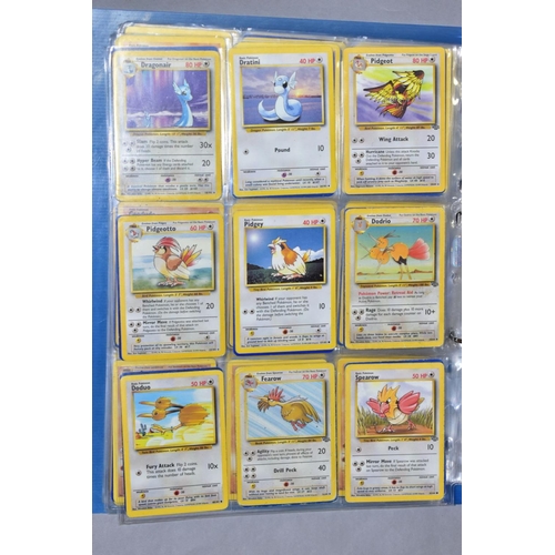 548 - A QUANTITY OF POKEMON CARDS - over four hundred cards of various sets including Base Set, Fossil Set... 