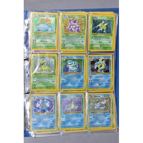 548 - A QUANTITY OF POKEMON CARDS - over four hundred cards of various sets including Base Set, Fossil Set... 