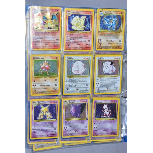 548 - A QUANTITY OF POKEMON CARDS - over four hundred cards of various sets including Base Set, Fossil Set... 