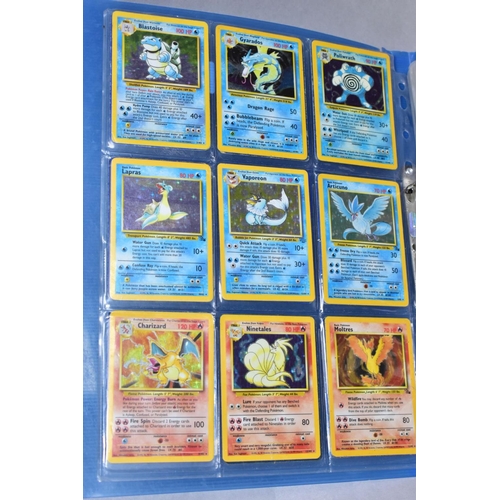 548 - A QUANTITY OF POKEMON CARDS - over four hundred cards of various sets including Base Set, Fossil Set... 