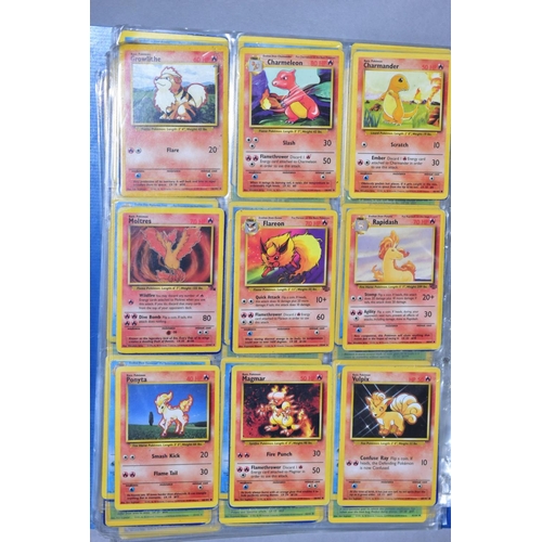 548 - A QUANTITY OF POKEMON CARDS - over four hundred cards of various sets including Base Set, Fossil Set... 