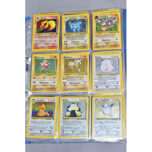 548 - A QUANTITY OF POKEMON CARDS - over four hundred cards of various sets including Base Set, Fossil Set... 