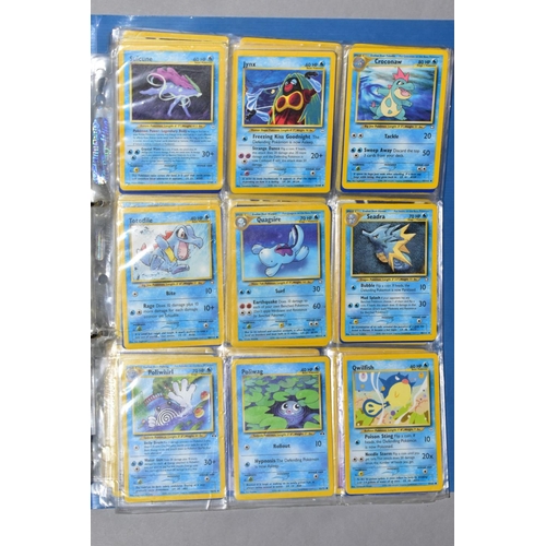 548 - A QUANTITY OF POKEMON CARDS - over four hundred cards of various sets including Base Set, Fossil Set... 