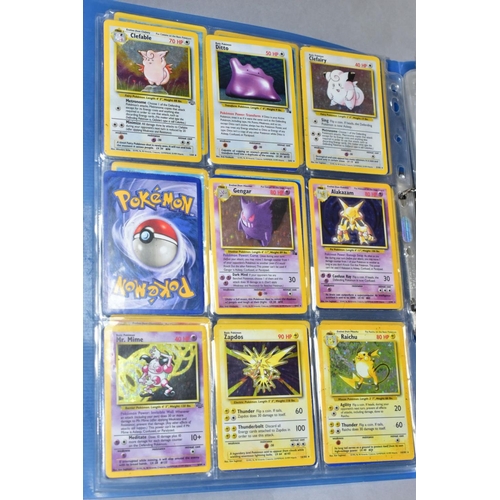 548 - A QUANTITY OF POKEMON CARDS - over four hundred cards of various sets including Base Set, Fossil Set... 