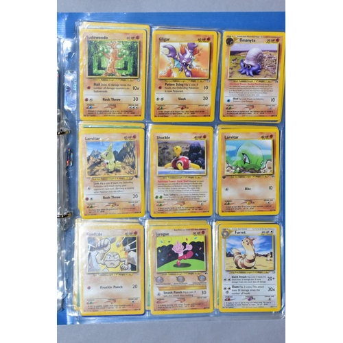 548 - A QUANTITY OF POKEMON CARDS - over four hundred cards of various sets including Base Set, Fossil Set... 