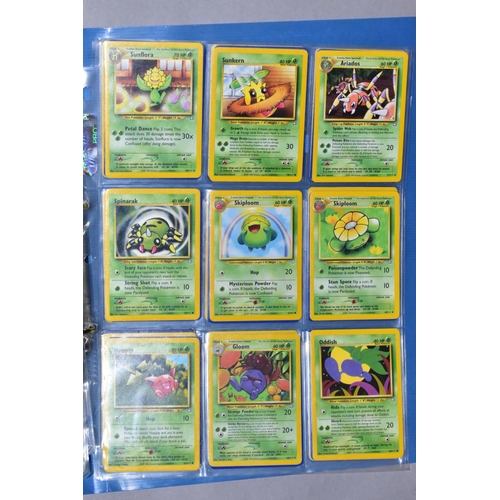 548 - A QUANTITY OF POKEMON CARDS - over four hundred cards of various sets including Base Set, Fossil Set... 