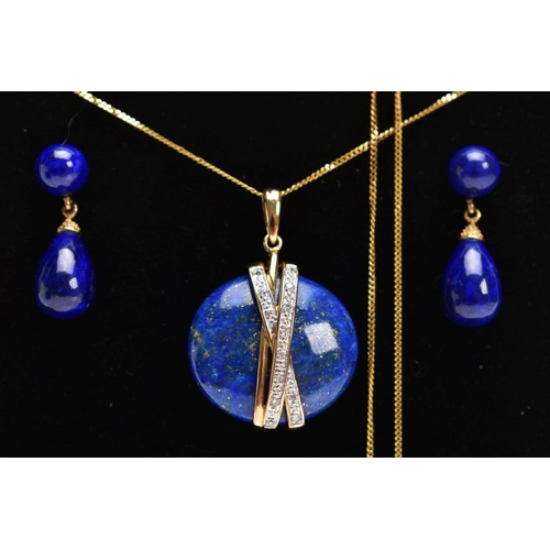 55 - A YELLOW METAL LAPIS LAZULI AND DIAMOND PENDANT NECKLACE AND EARRING GIFT SET, the pendant designed ... 