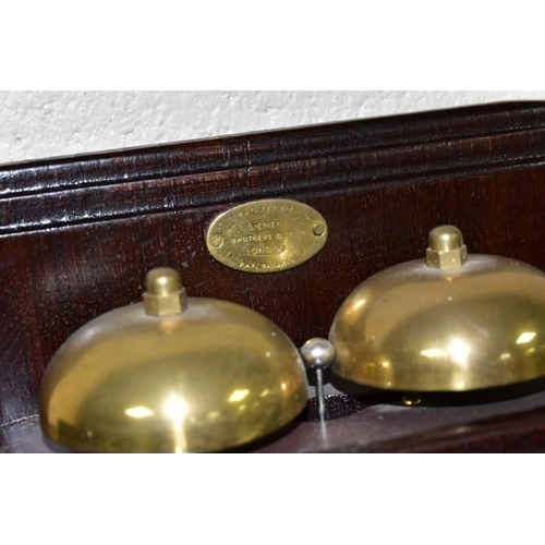 561 - A REPRODUCTION SIEMENS BROTHERS WALL MOUNTED TELEPHONE, wooden body with brass and bakelite fittings... 