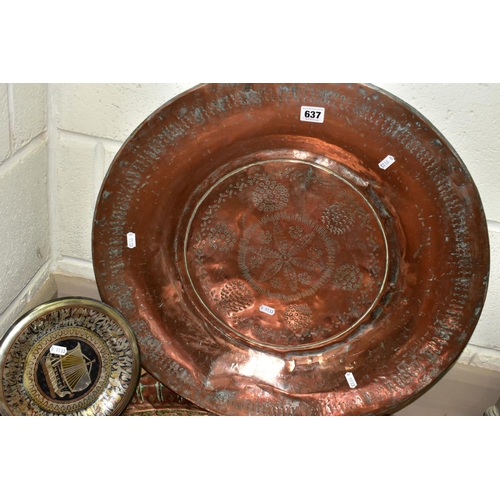 637 - A COLLECTION OF SEVEN INDIAN/MIDDLE EASTERN METAL PLATTERS, CHARGERS AND TRAYS, all either embossed ... 