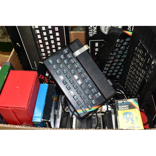 650 - A BOX OF RETRO GAMING EQUIPMENT AND ACCESSORIES, including a boxed Sinclair ZX Spectrum+ computer an... 