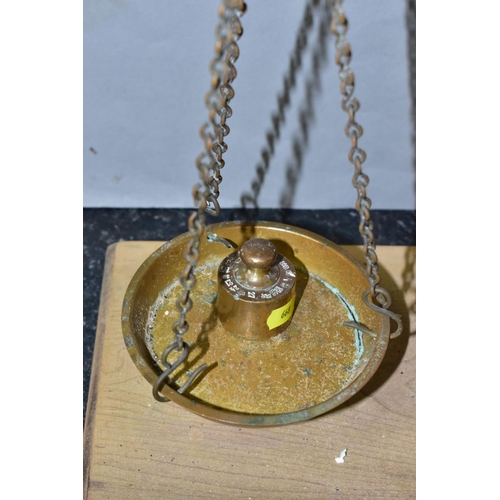 668 - AN EARLY 20TH CENTURY BALANCE BEAM SCALE WITH WEIGHTS, impressed G.R mark with calibration numbers, ... 