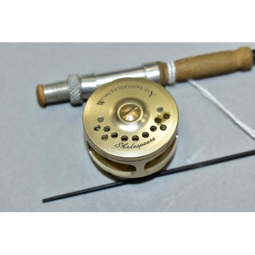 669 - A SHAKESPEARE WORCESTERSHIRE FLY MINIATURE FLY REEL AND ROD, 1¼ inch (3cm) diameter, total length 75... 