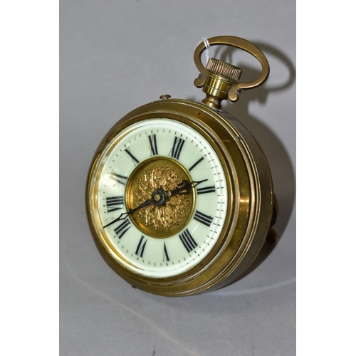 672 - A BRASS CASED DESK CLOCK CIRCA EARLY 20TH CENTURY, in the style of a Goliath pocket watch, the chapt... 