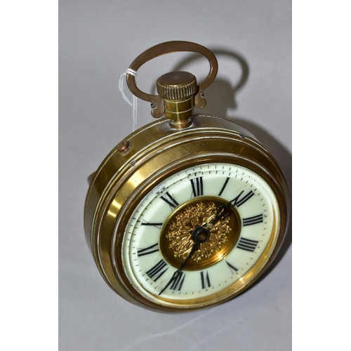 672 - A BRASS CASED DESK CLOCK CIRCA EARLY 20TH CENTURY, in the style of a Goliath pocket watch, the chapt... 