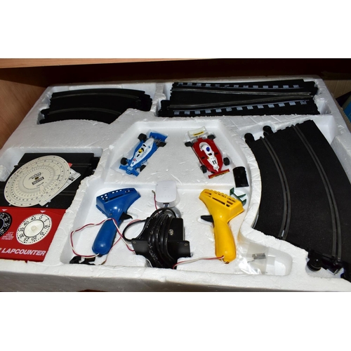 678 - A BOXED SCALEXTRIC 500 ELECTRIC MODEL CAR RACING SET, No C636, complete with correct cars (Tyrell Fo... 