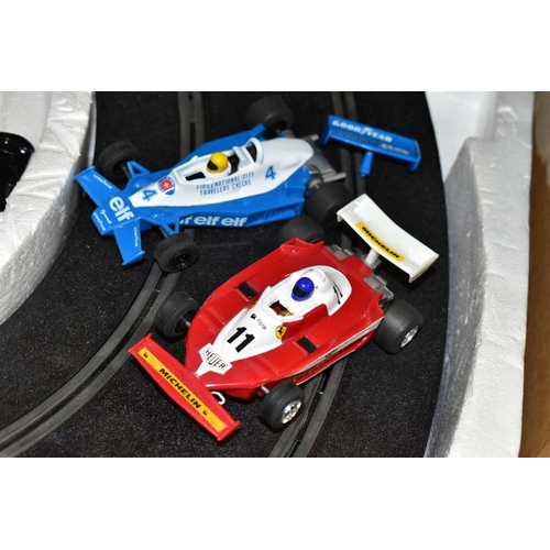 678 - A BOXED SCALEXTRIC 500 ELECTRIC MODEL CAR RACING SET, No C636, complete with correct cars (Tyrell Fo... 