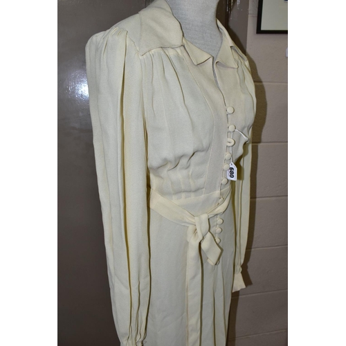 680 - OSSIE CLARK FOR RADLEY, a Moss Crepe cream ankle length dress, size 34, wing collar, long pleated sl... 