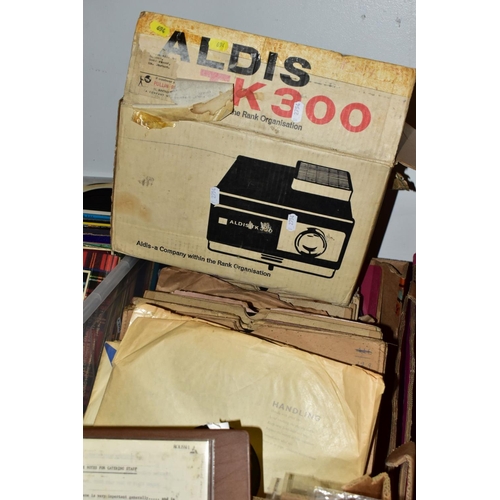 694 - FIVE BOXES OF RECORDS, NEGATIVES, ETC, including a boxed Aldis TK 300 projector, a box of coat hange... 