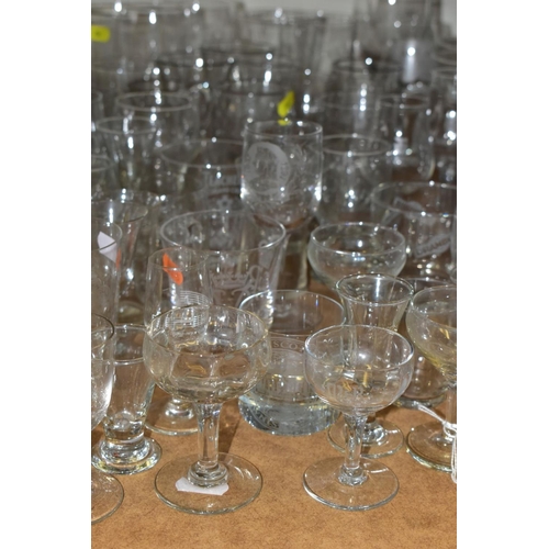 724 - A QUANTITY OF ETCHED DRINKING GLASSES, mostly from pubs and hotels, and brewerys, etc, late 19th to ... 