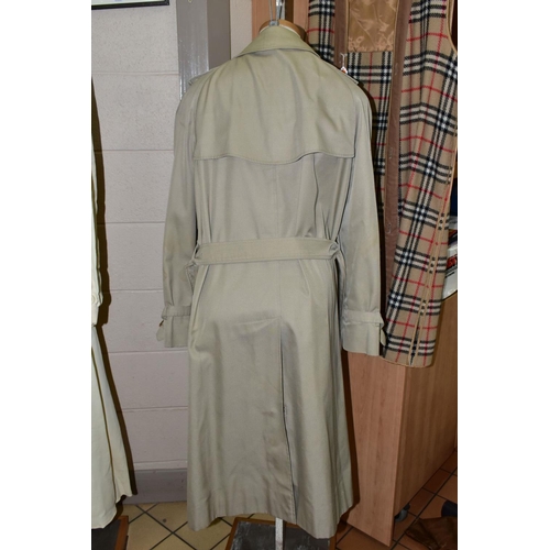 758 - A LADIES BURBERRY TRENCH COAT, with detachable wool lining, approximate size 16/18 (staining to fron... 