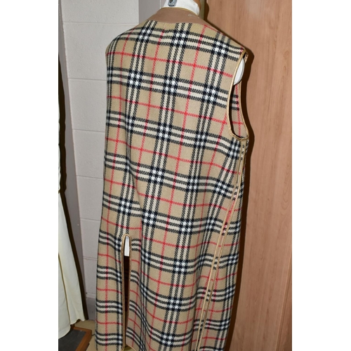 758 - A LADIES BURBERRY TRENCH COAT, with detachable wool lining, approximate size 16/18 (staining to fron... 