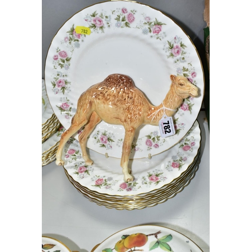 782 - A BESWICK CAMEL MODEL No 1044 TOGETHER WITH THREE ROYAL DOULTON LADIES, comprising 'Autumn Breezes' ... 