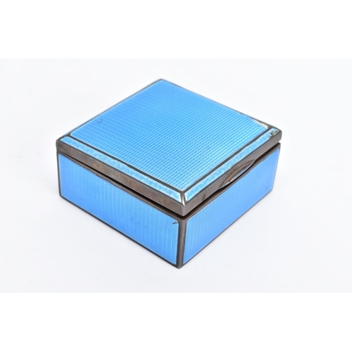 82 - A 1930'S SILVER GUILLOCHE ENAMEL TRINKET BOX, the square hinged silver box covered in blue guilloche... 