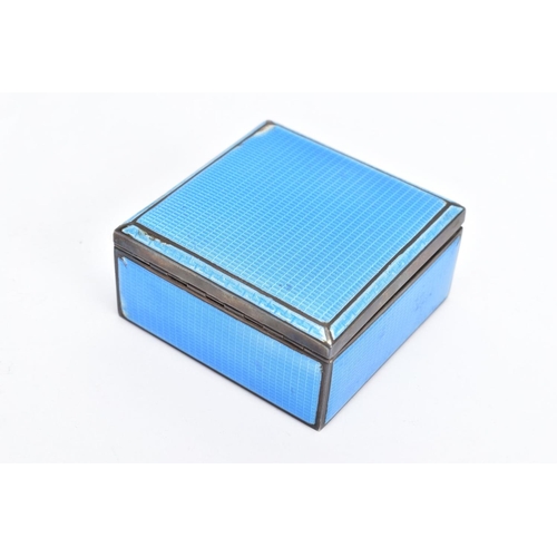 82 - A 1930'S SILVER GUILLOCHE ENAMEL TRINKET BOX, the square hinged silver box covered in blue guilloche... 