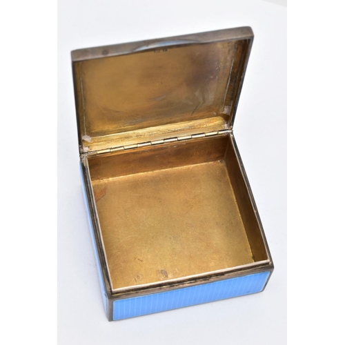 82 - A 1930'S SILVER GUILLOCHE ENAMEL TRINKET BOX, the square hinged silver box covered in blue guilloche... 