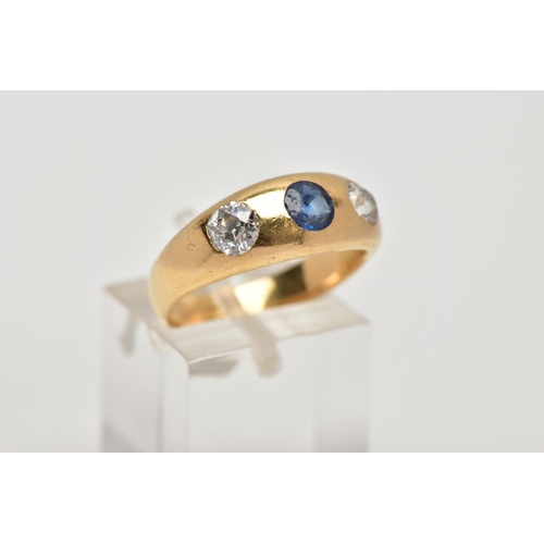 86 - AN EARLY 20TH CENTURY 18CT GOLD DIAMOND AND SAPPHIRE RING, the tapered band plush set with a central... 