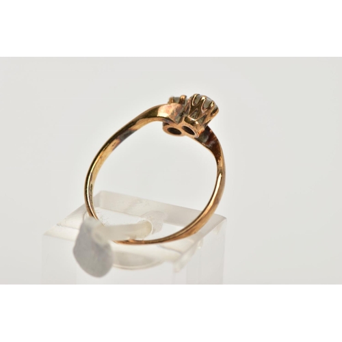 96 - A 9CT GOLD CUBIC ZIRCONIA RING, of a cross over design, set with two colourless circular cut cubic z... 