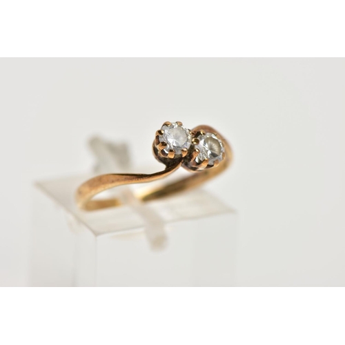 96 - A 9CT GOLD CUBIC ZIRCONIA RING, of a cross over design, set with two colourless circular cut cubic z... 