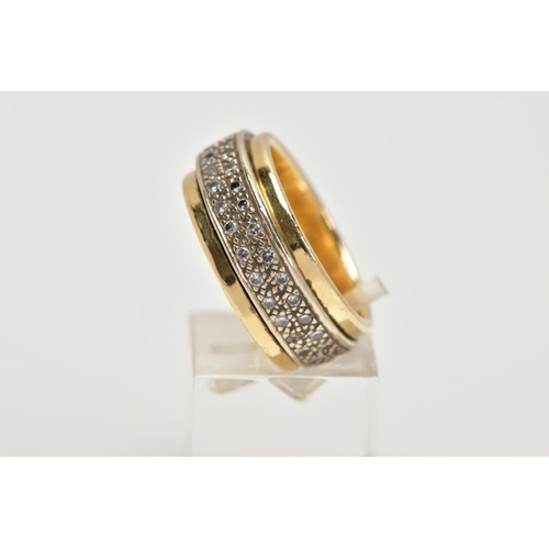 97 - A YELLOW METAL DIAMOND SET SWIVEL BAND RING, wide yellow metal band, approximate width 9.3mm, with a... 