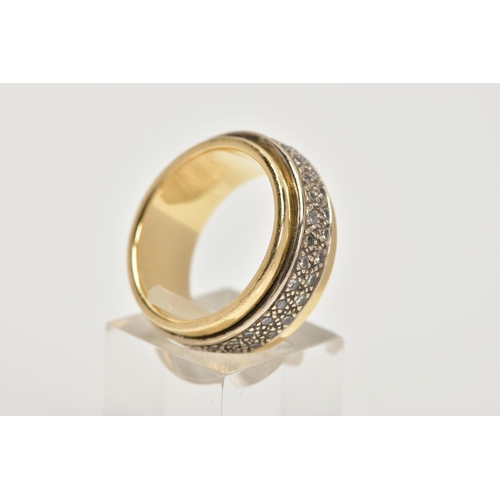 97 - A YELLOW METAL DIAMOND SET SWIVEL BAND RING, wide yellow metal band, approximate width 9.3mm, with a... 