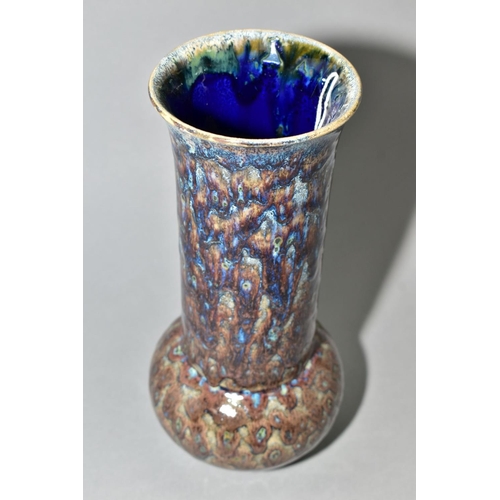 11 - A COBRIDGE STONEWARE HIGH FIRED BULBOUS VASE WITH ELONGATED CYLINDRICAL NECK, mottled brown blue sli... 