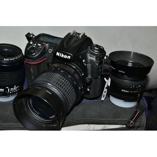 112 - A NIKON D300S DIGITAL SLR CAMERA fitted with a Nikkor AF-S DX 18-55mm f3.5, a Nikkor AF 35-80mm f4 l... 