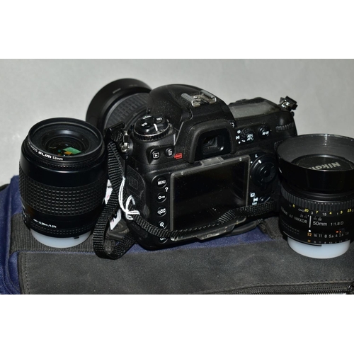 112 - A NIKON D300S DIGITAL SLR CAMERA fitted with a Nikkor AF-S DX 18-55mm f3.5, a Nikkor AF 35-80mm f4 l... 