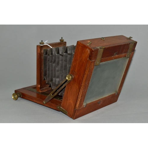 124 - A MAHOGANY AND BRASS CASED 6X8 PLATE CAMERA with a C.P. Goerz, Berlin lens assembly and a Goerz Anas... 