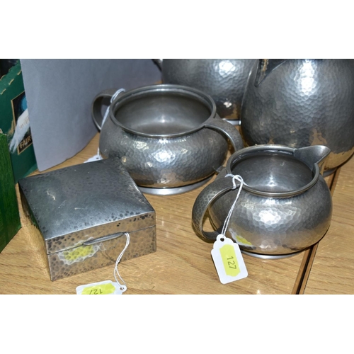 127 - AN EARLY 20TH CENTURY SOLKETS 'TUDRIC' PEWTER FOUR PIECE HAND HAMMERED TEA SET, all numbered 01075, ... 