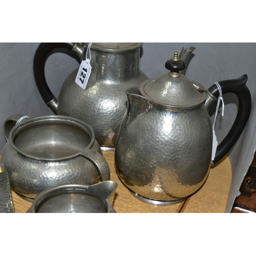 127 - AN EARLY 20TH CENTURY SOLKETS 'TUDRIC' PEWTER FOUR PIECE HAND HAMMERED TEA SET, all numbered 01075, ... 