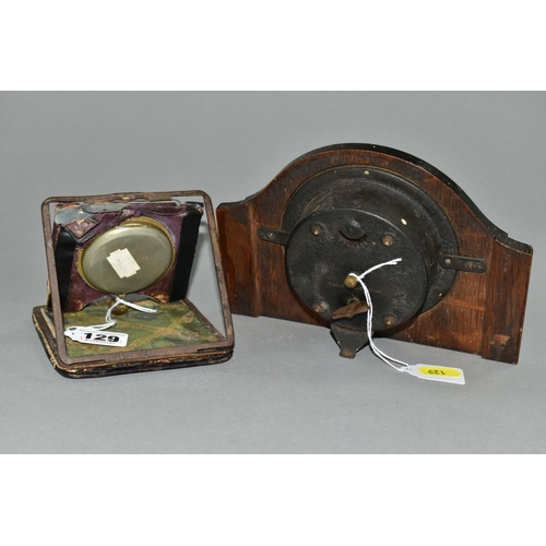 129 - AN EARLY 20TH CENTURY ASPREY 8 DAY TRAVEL CLOCK, in a damaged leather folding case, incomplete, toge... 