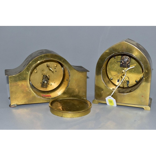 131 - TWO EARLY 20TH CENTURY BRASS CASED MANTEL CLOCKS, one domed, the other arched, both with Arabic nume... 