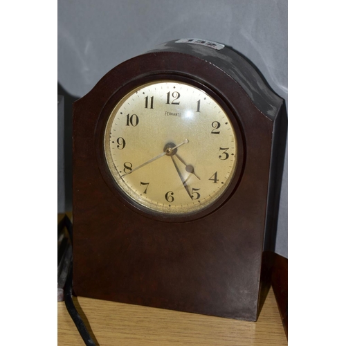 132 - THREE BROWN BAKELITE CASED ELECTRIC MANTEL CLOCKS, comprising a Ferranti, height 17.5cm, a Genolex w... 