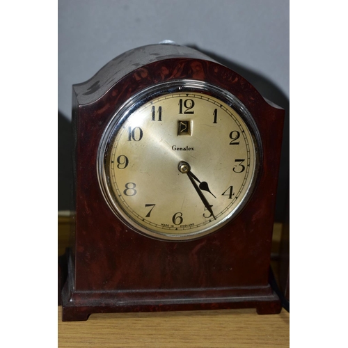 132 - THREE BROWN BAKELITE CASED ELECTRIC MANTEL CLOCKS, comprising a Ferranti, height 17.5cm, a Genolex w... 